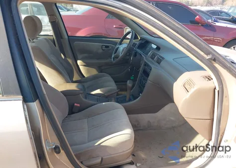 1999 Toyota Camry Le from USA, damaged, VIN 4T1BG22K5XU875622